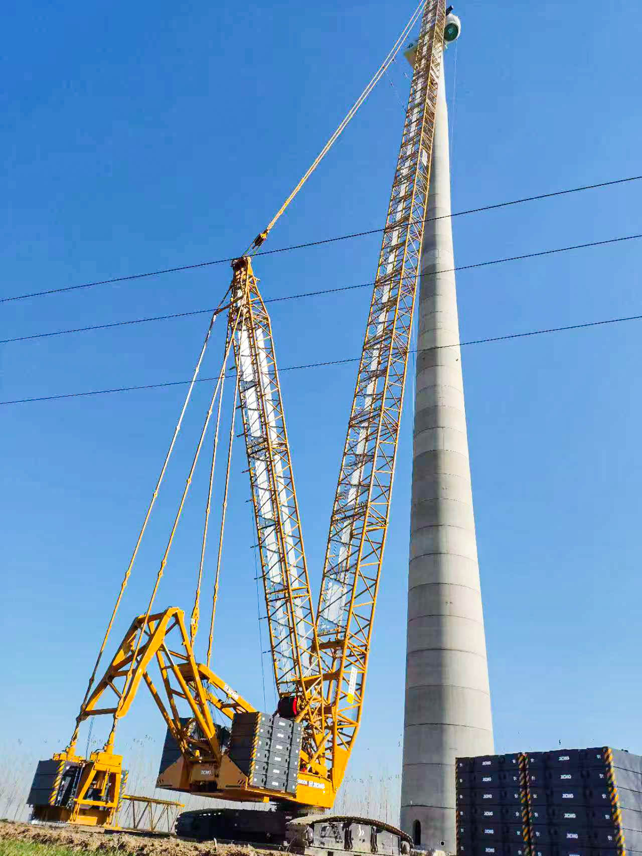 160米高空精准“搭积木”：云顶集团XLC15000M分体吊装6.25兆瓦风机全纪录